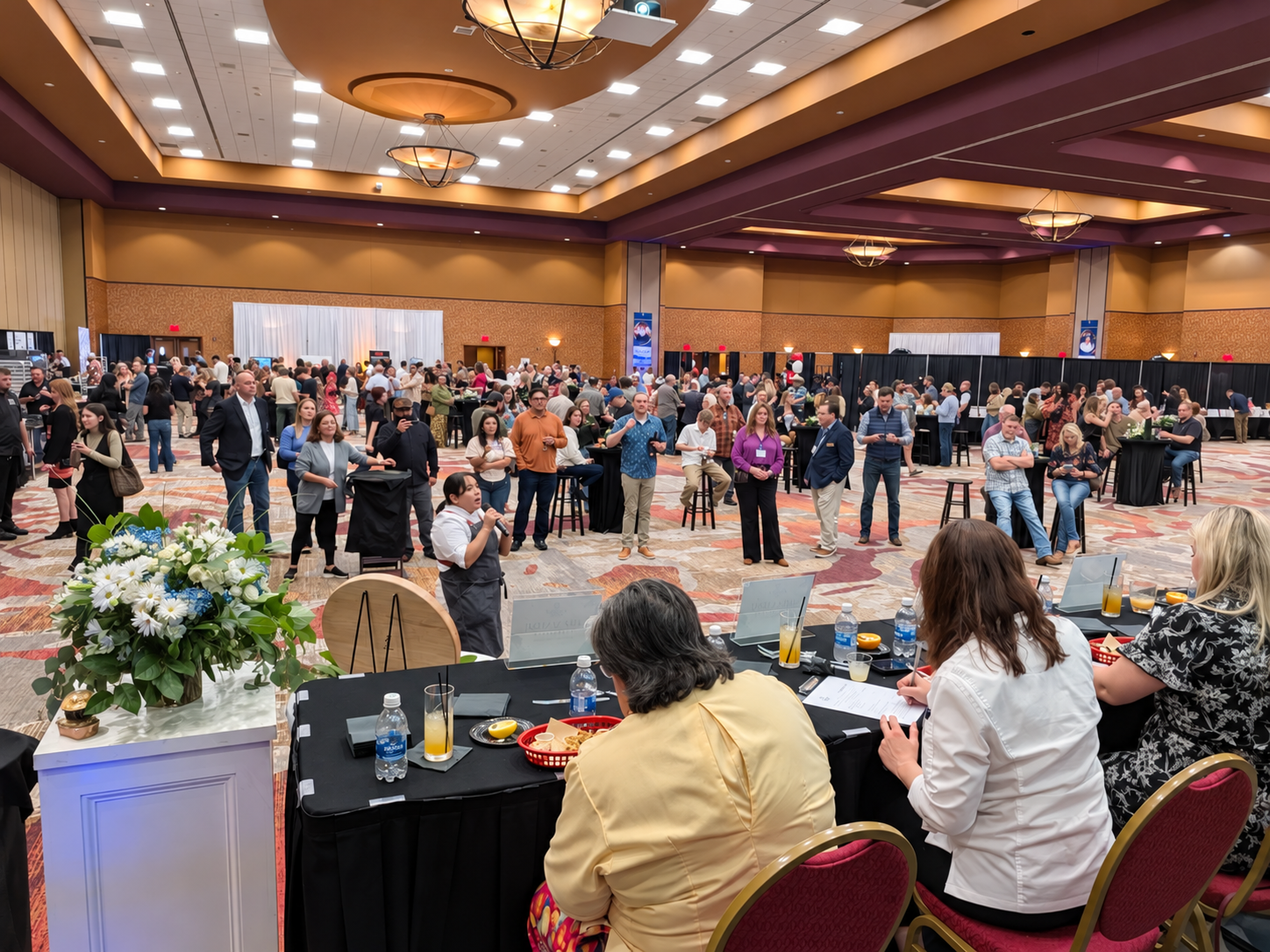 Guests mingle at the Rogers Convention Center during Premier Chef Northwest Arkansas