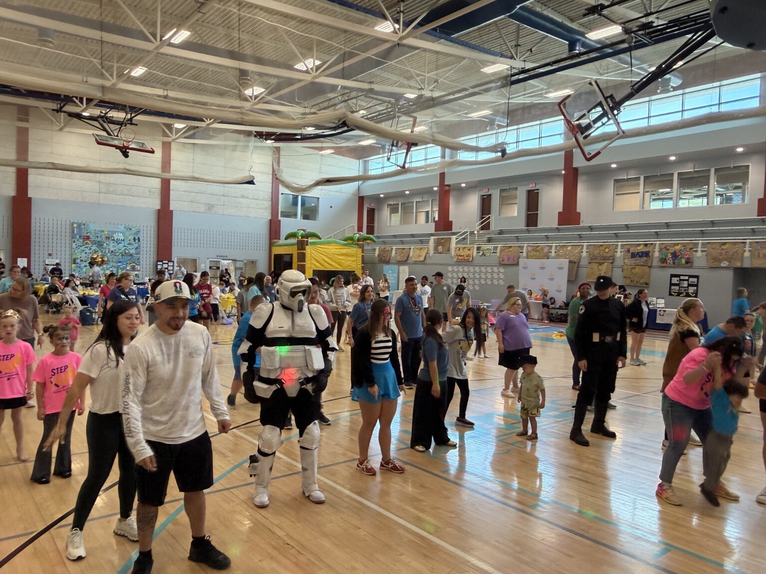 A group of guests joins in a dance at Step Up for Down Syndrome 2026